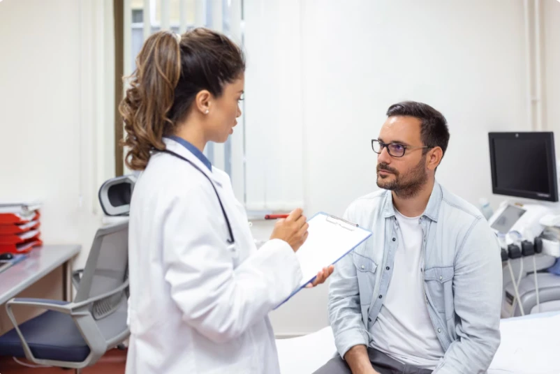 Provider explaining treatment plan to patient at Harmony Health and Psychiatry