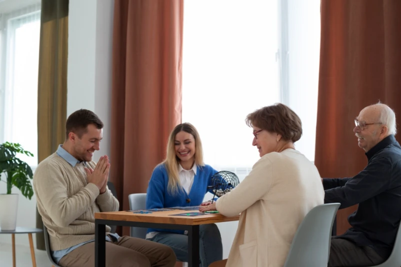 Therapist leading a calm group anger management session with adults in a warm office setting
